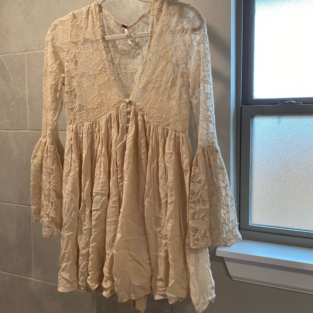 Free people, wore a couple of times, runs big, size small